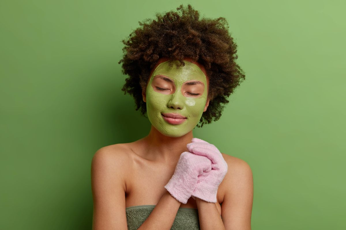 woman wears sheet mask